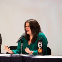 Woman speaking three